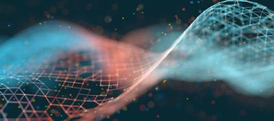 Abstract glowing particle wave on a dark background
