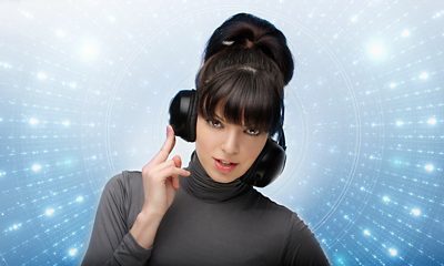 Girl with headphones, getty 178422511