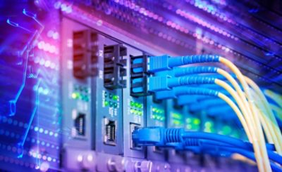 Fiber Optic cables connected to optic ports