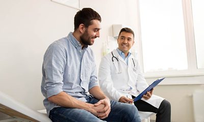 Man talking to doctor