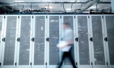 Person walking in server room