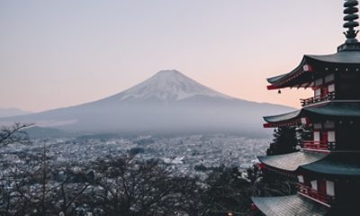 Japanese city with Mt. Fuji in the distance