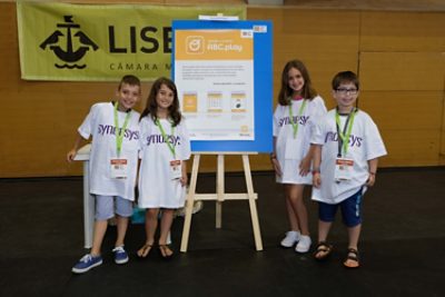 volunteers in Lisbon partnered with Causaus XXI to help mentor students at a local school in coding and robotics. 