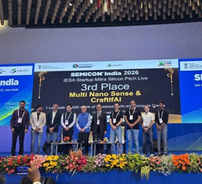 Multi Nano Sense & CraftAI group onstage beneath the third-place Silicon Pitch Live announcement