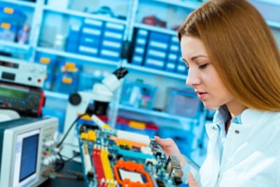 Woman Working on Power Conversion Systems